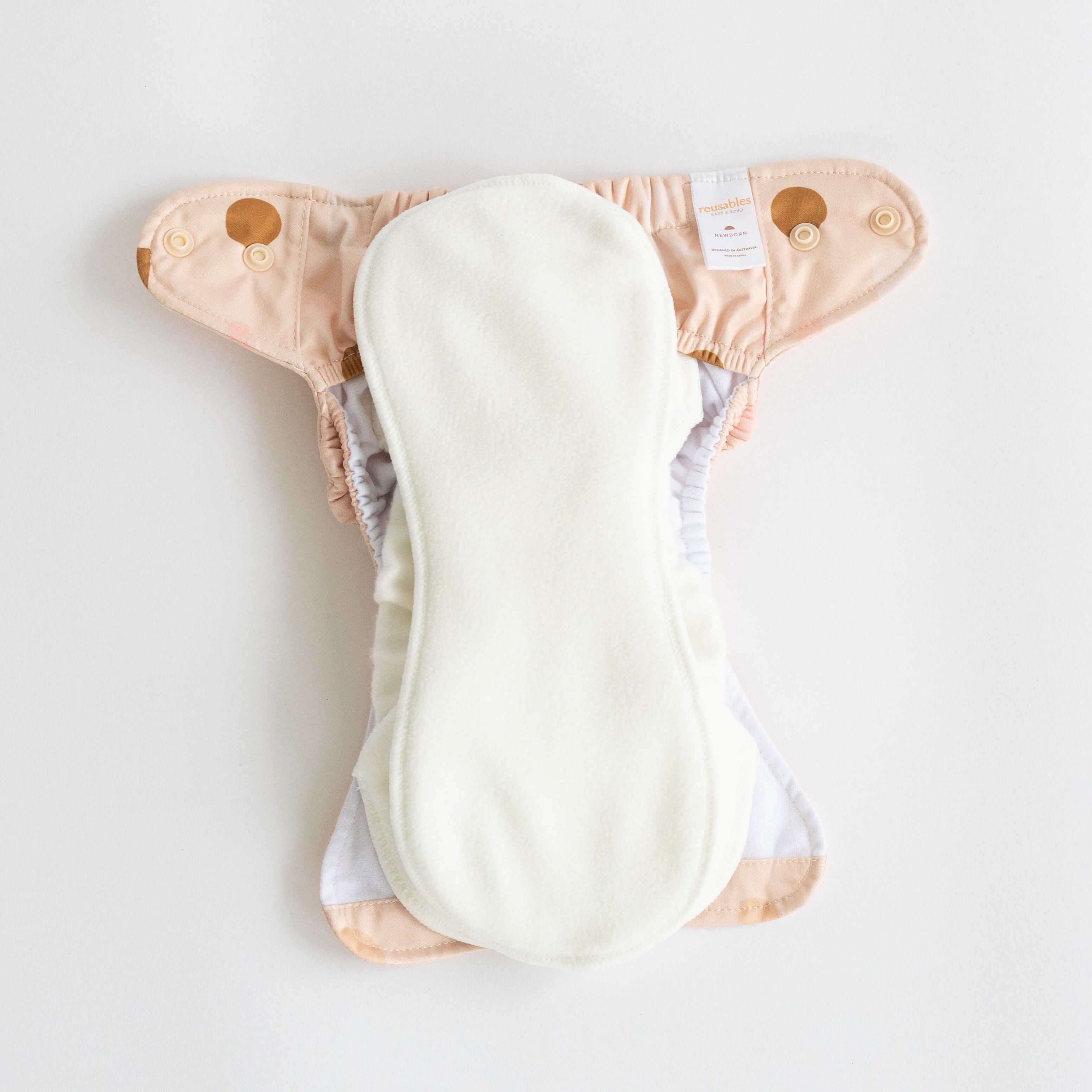 Newborn Soft Cover Nappy 2.0 | Blush Shapes